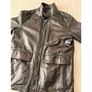 Daniel Cremieux chocolate brown lamb skin premium leather men's coat. Very soft.